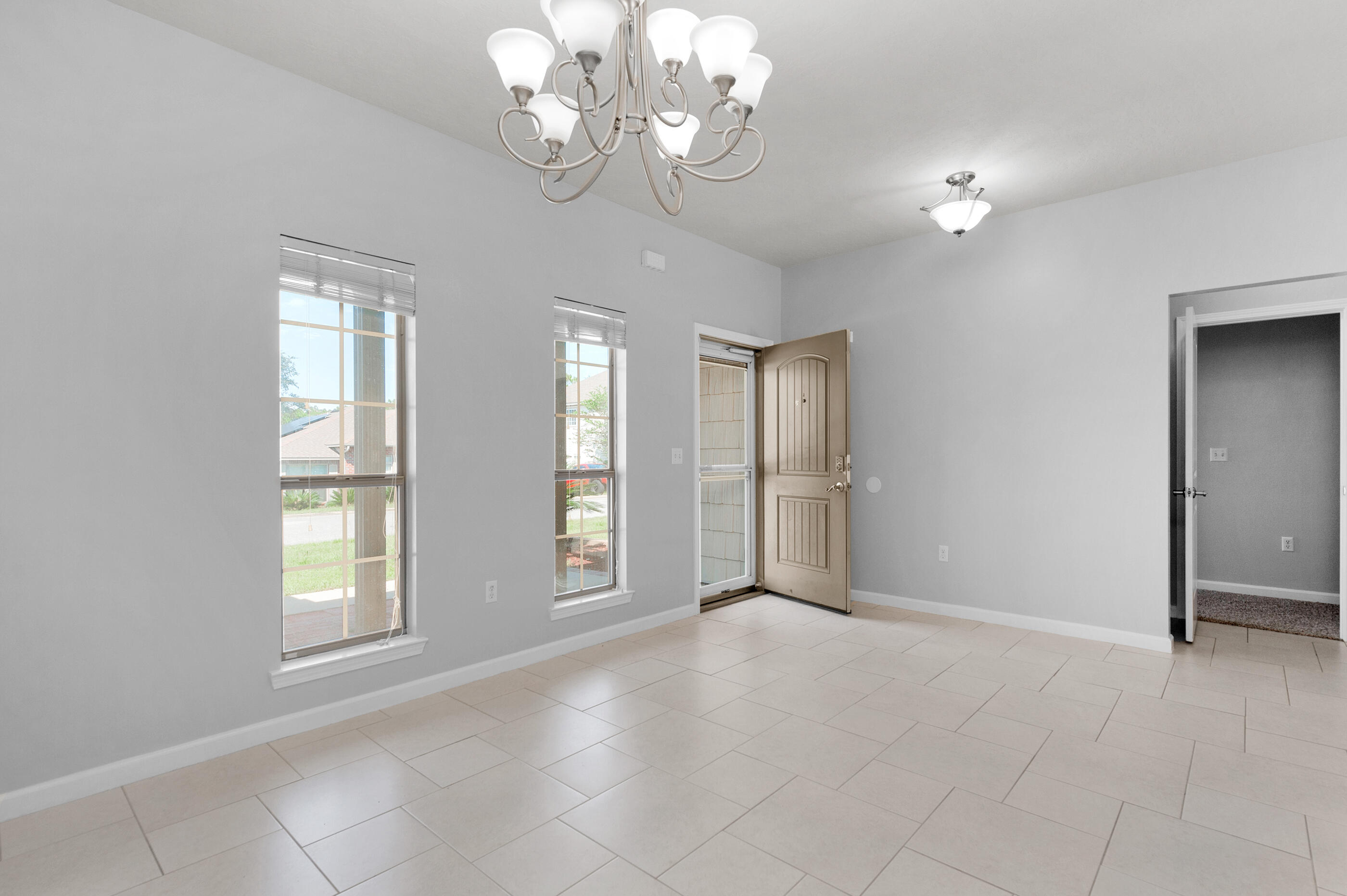 4586 Hermosa Road Crestview, FL 32539 - Photo 3 of 26 a view of an empty room with a window