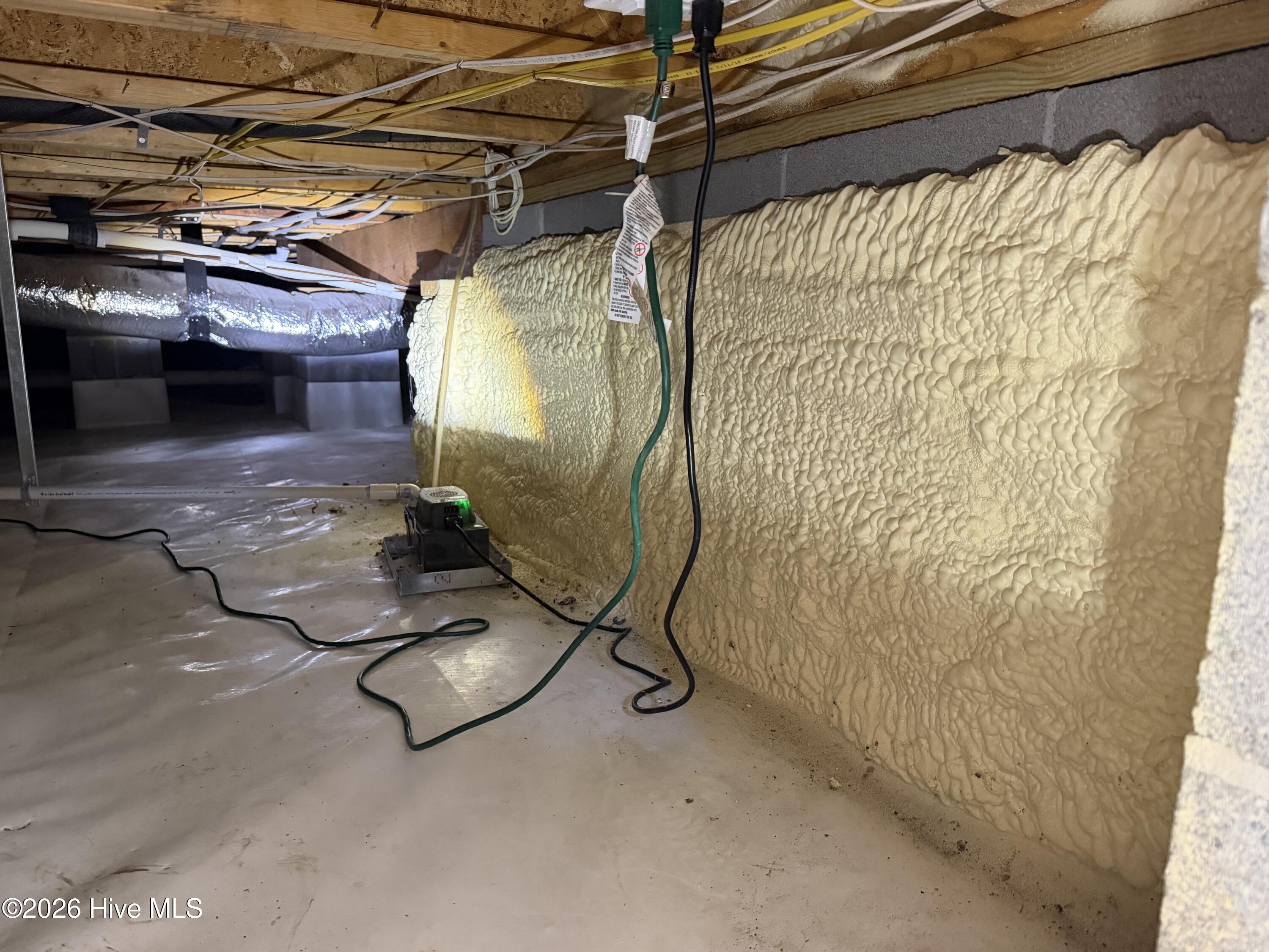 6197 Castlebrook Way Southwest Ocean Isle Beach, NC 28469 - Photo 97 of 120 insulation on the walls in crawlspace