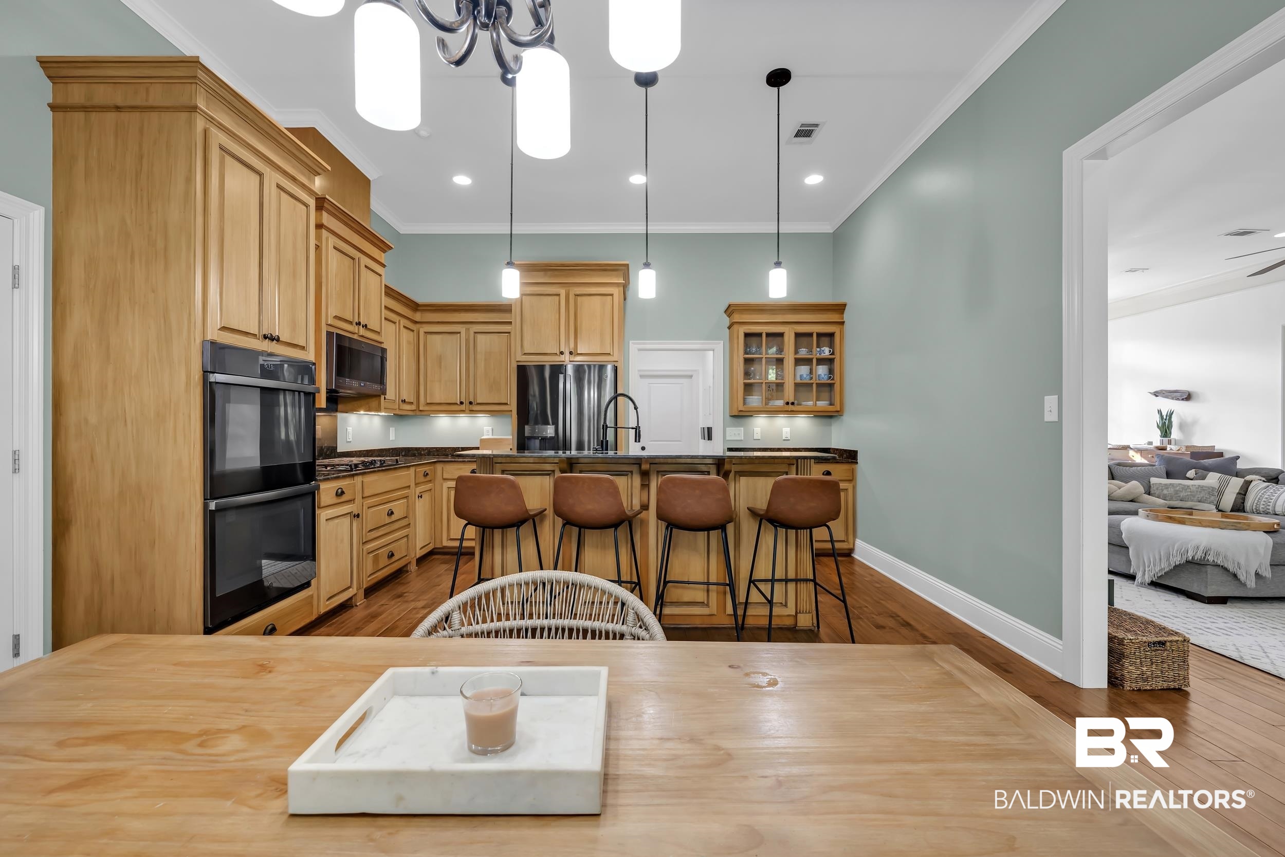 8137 Pine Run Daphne, AL 36527 - Photo 20 of 67 Kitchen featuring light wood cabinetry, dark countertops, and stainless steel appliances