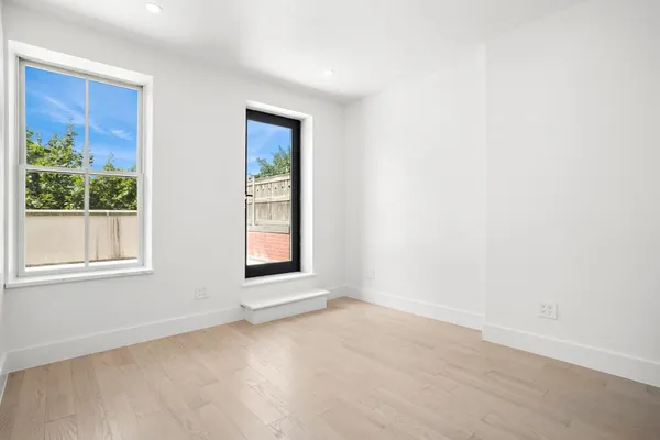 an empty room with windows