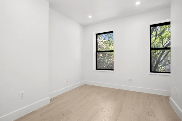 an empty room with windows
