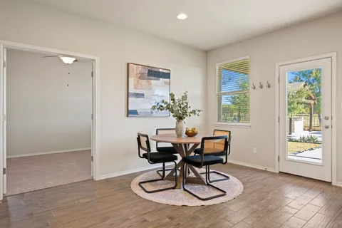 a workspace with furniture and window