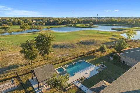 a view of an ocean and city