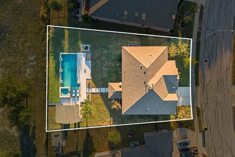 an aerial view of balcony with wooden floor