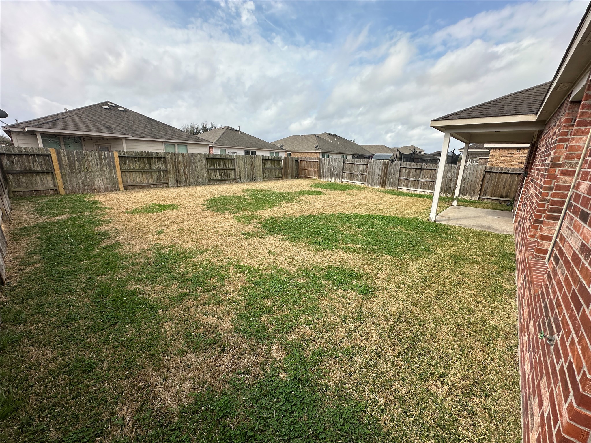 819 Messina Lane Rosenberg, TX 77469 - Photo 25 of 25 a front view of a house with a yard
