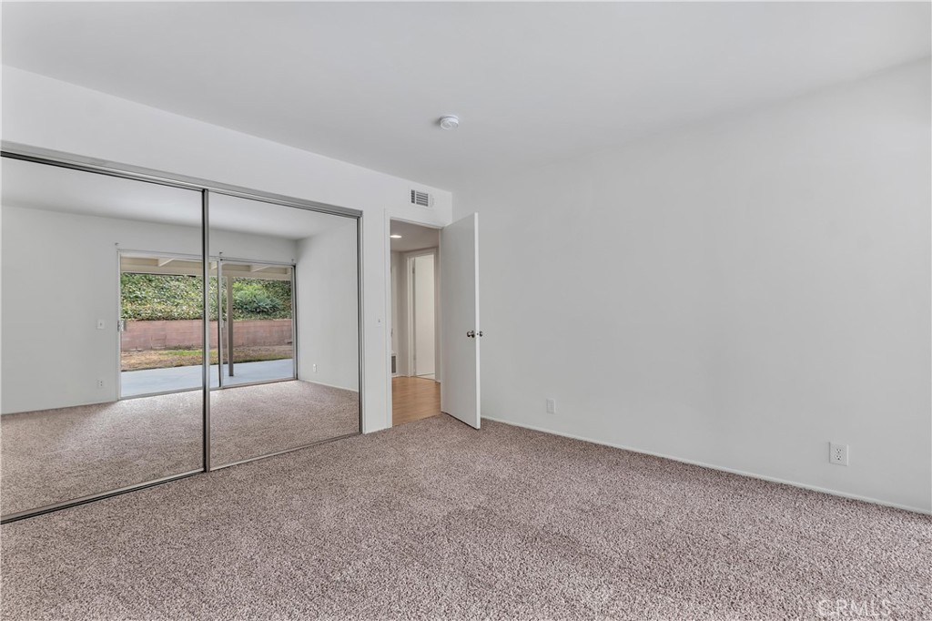 19034 Killoch Way Porter Ranch, CA 91326 - Photo 19 of 42 a view of an empty room with glass door