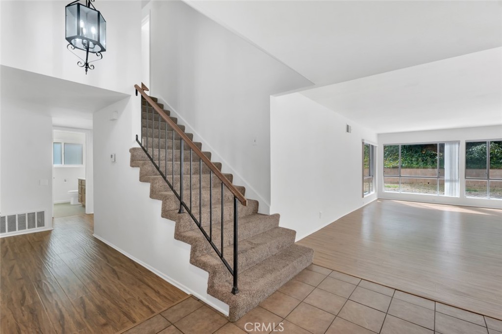 19034 Killoch Way Porter Ranch, CA 91326 - Photo 20 of 42 a view of entryway and hall with wooden floor