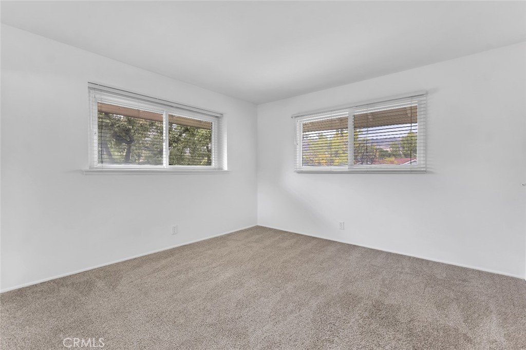 19034 Killoch Way Porter Ranch, CA 91326 - Photo 25 of 42 an empty room with windows
