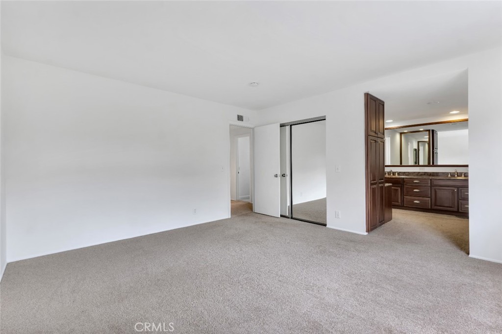 19034 Killoch Way Porter Ranch, CA 91326 - Photo 28 of 42 a view of an empty room with a window