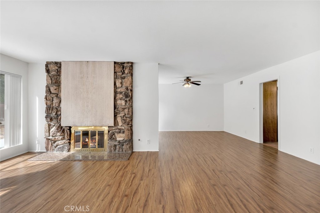 19034 Killoch Way Porter Ranch, CA 91326 - Photo 5 of 42 wooden floor in an empty room with a window