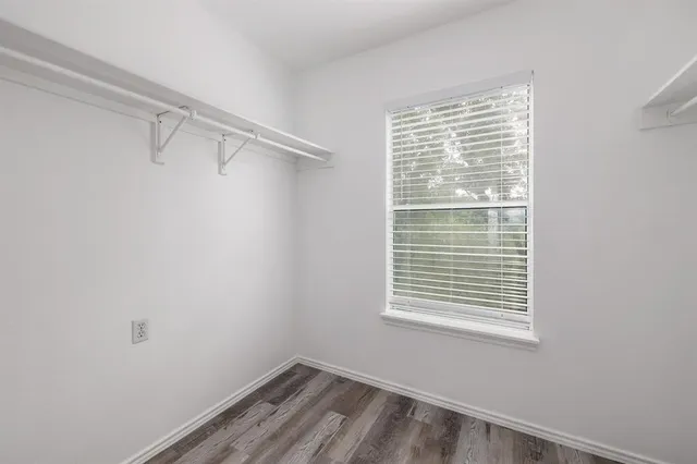 a view of a room that has a window in it