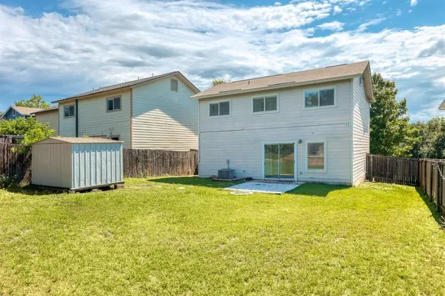 a house view with a garden space