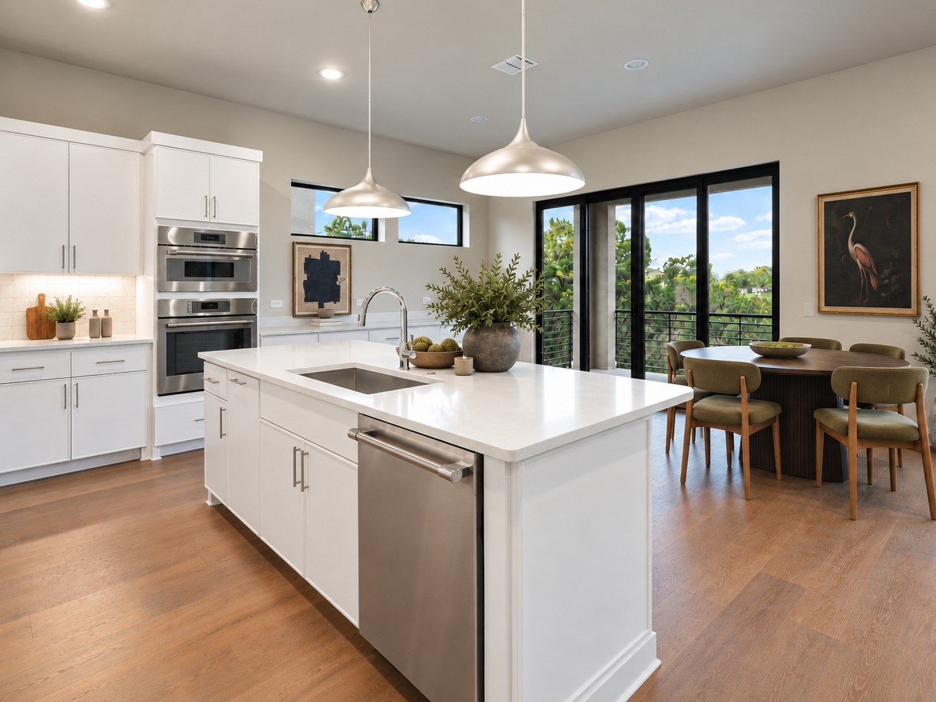 9803 Ribelin Ranch Court, Unit 16 Austin, TX 78750 - Photo 1 of 31 Engineered hardwood floors connect this open kitchen to the balcony space with greenbelt views.
