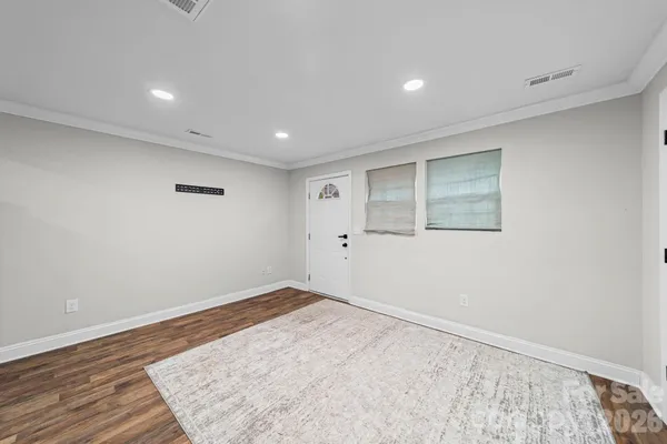 a view of a living room and dining room