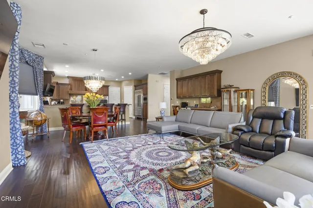 a kitchen with a sink stove top oven and microwave