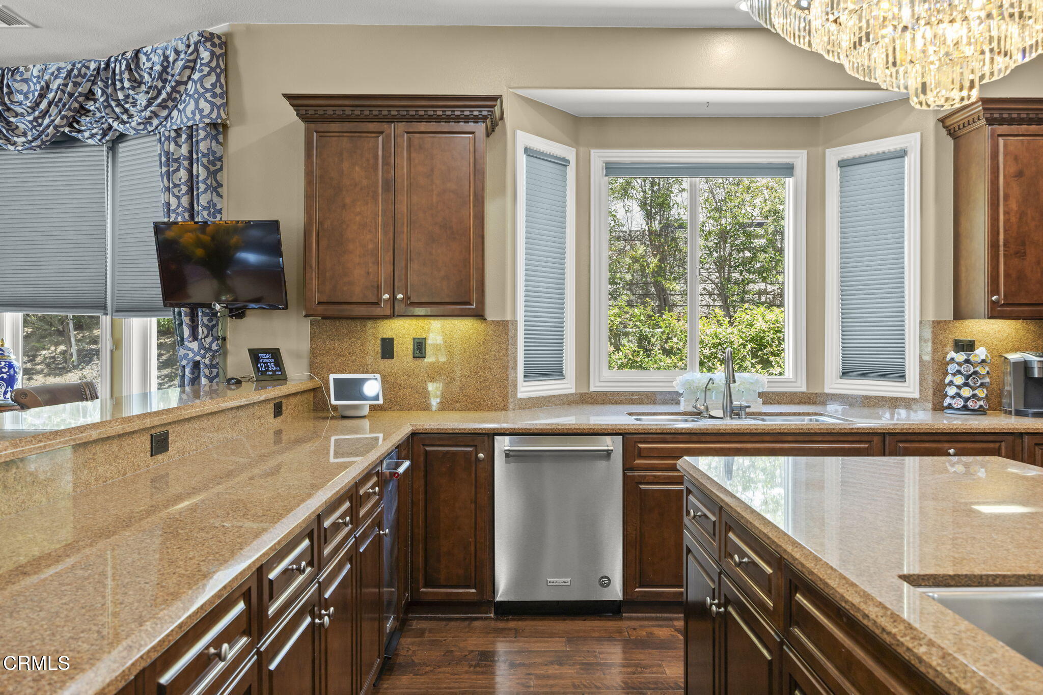12390 Nelson Road Moorpark, CA 93021 - Photo 16 of 66 a kitchen with a sink stove top oven and microwave