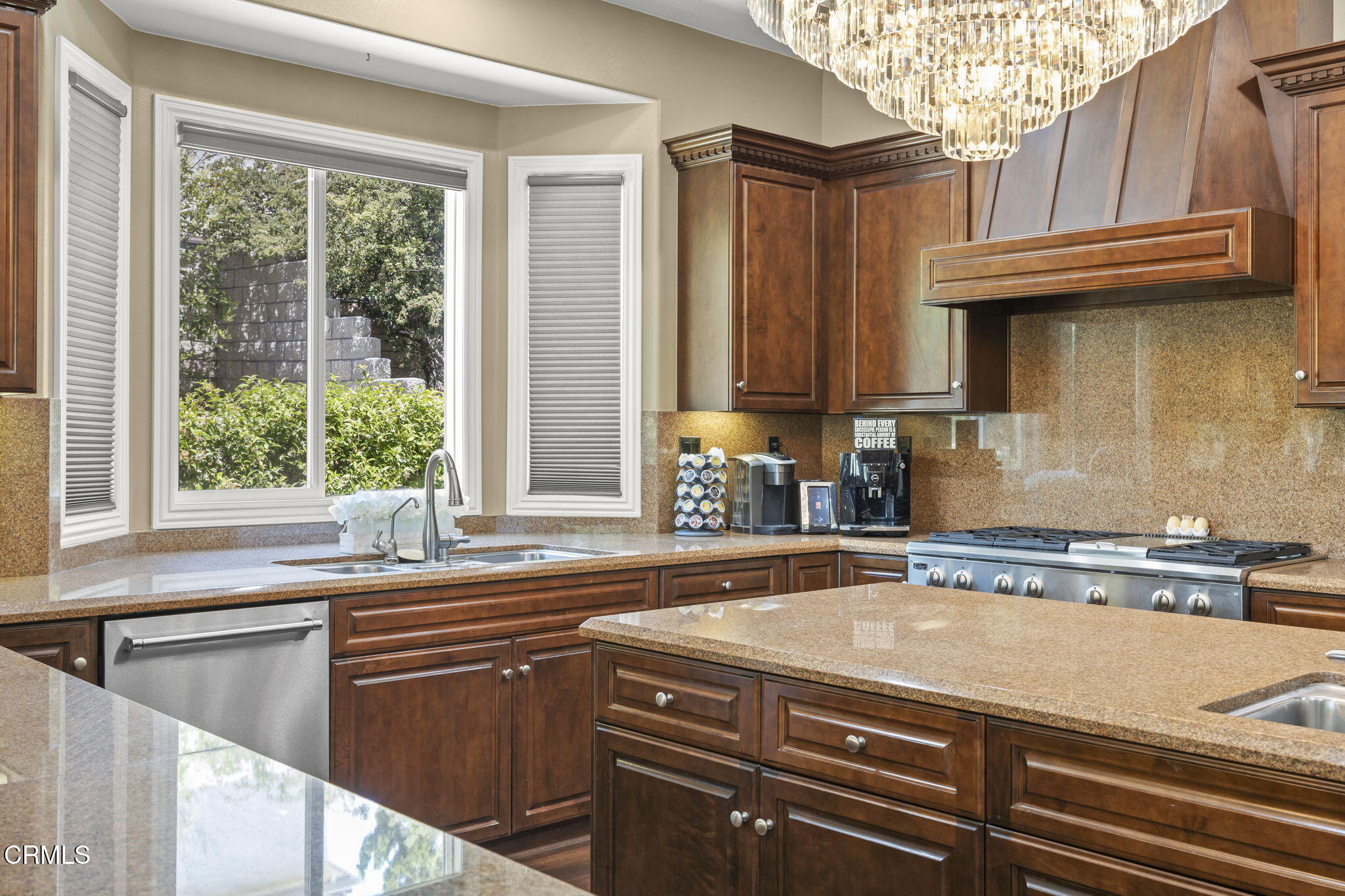 12390 Nelson Road Moorpark, CA 93021 - Photo 17 of 66 a kitchen with stainless steel appliances granite countertop a sink a stove and a microwave