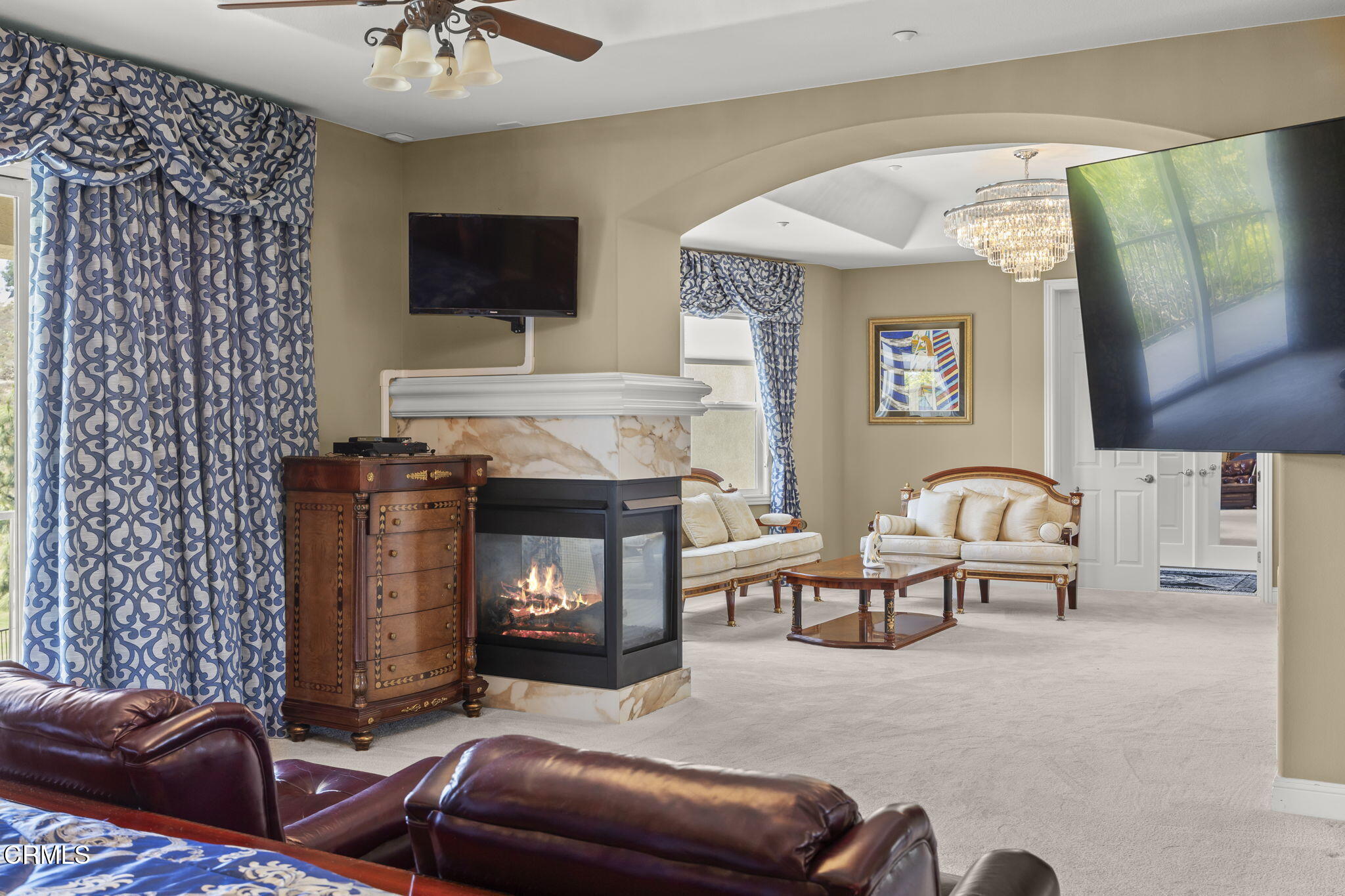 12390 Nelson Road Moorpark, CA 93021 - Photo 27 of 66 a living room with furniture and a flat screen tv