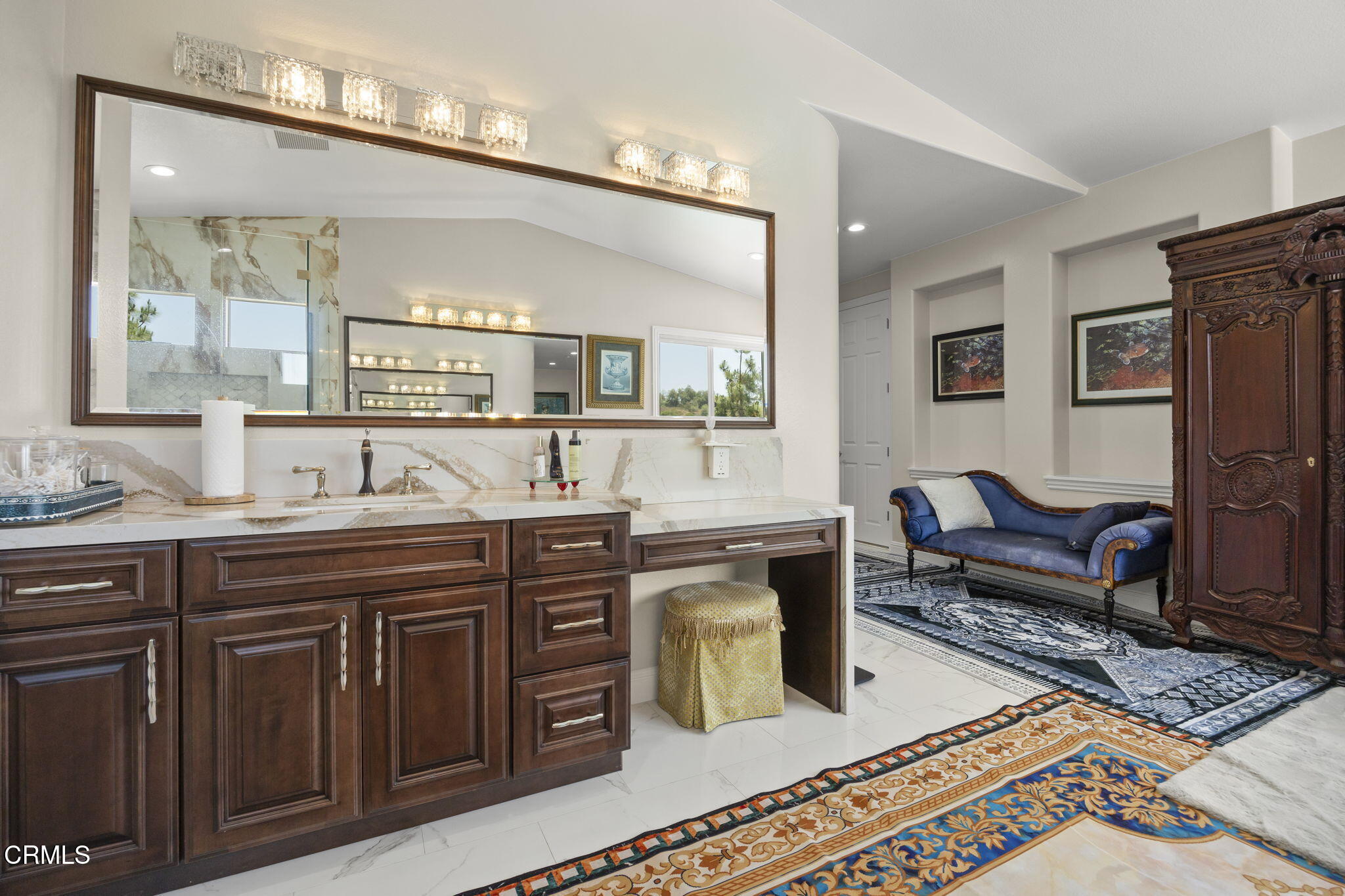 12390 Nelson Road Moorpark, CA 93021 - Photo 33 of 66 a spacious bathroom with a granite countertop sink a mirror and a