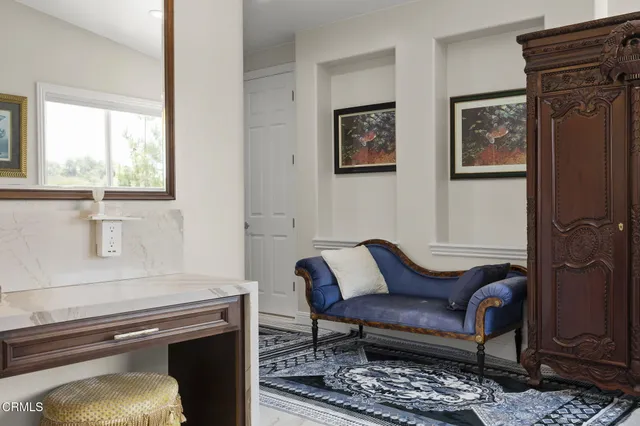 a bedroom with bed and window