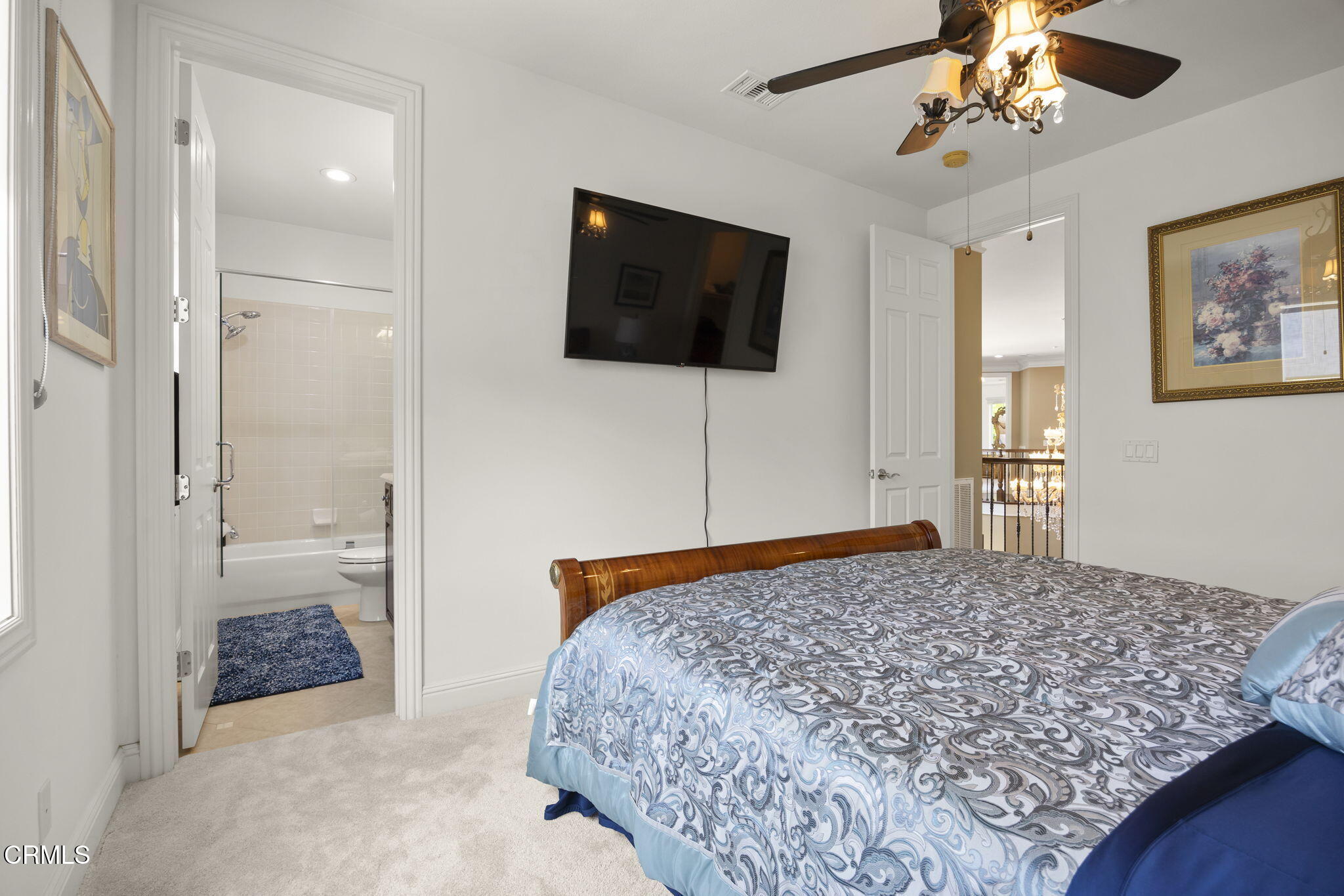 12390 Nelson Road Moorpark, CA 93021 - Photo 38 of 66 a bedroom with a bed and a flat screen tv