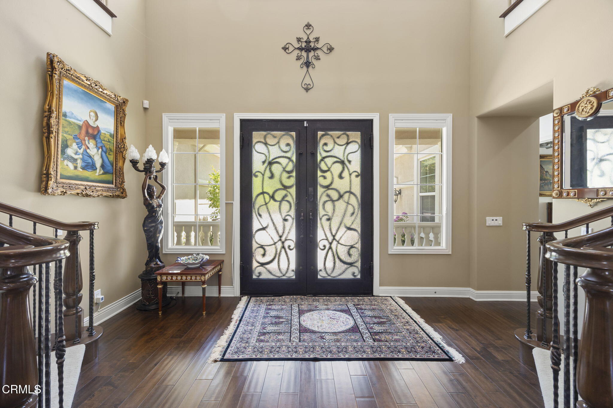 12390 Nelson Road Moorpark, CA 93021 - Photo 4 of 66 a view of an entryway with wooden floor and a fireplace
