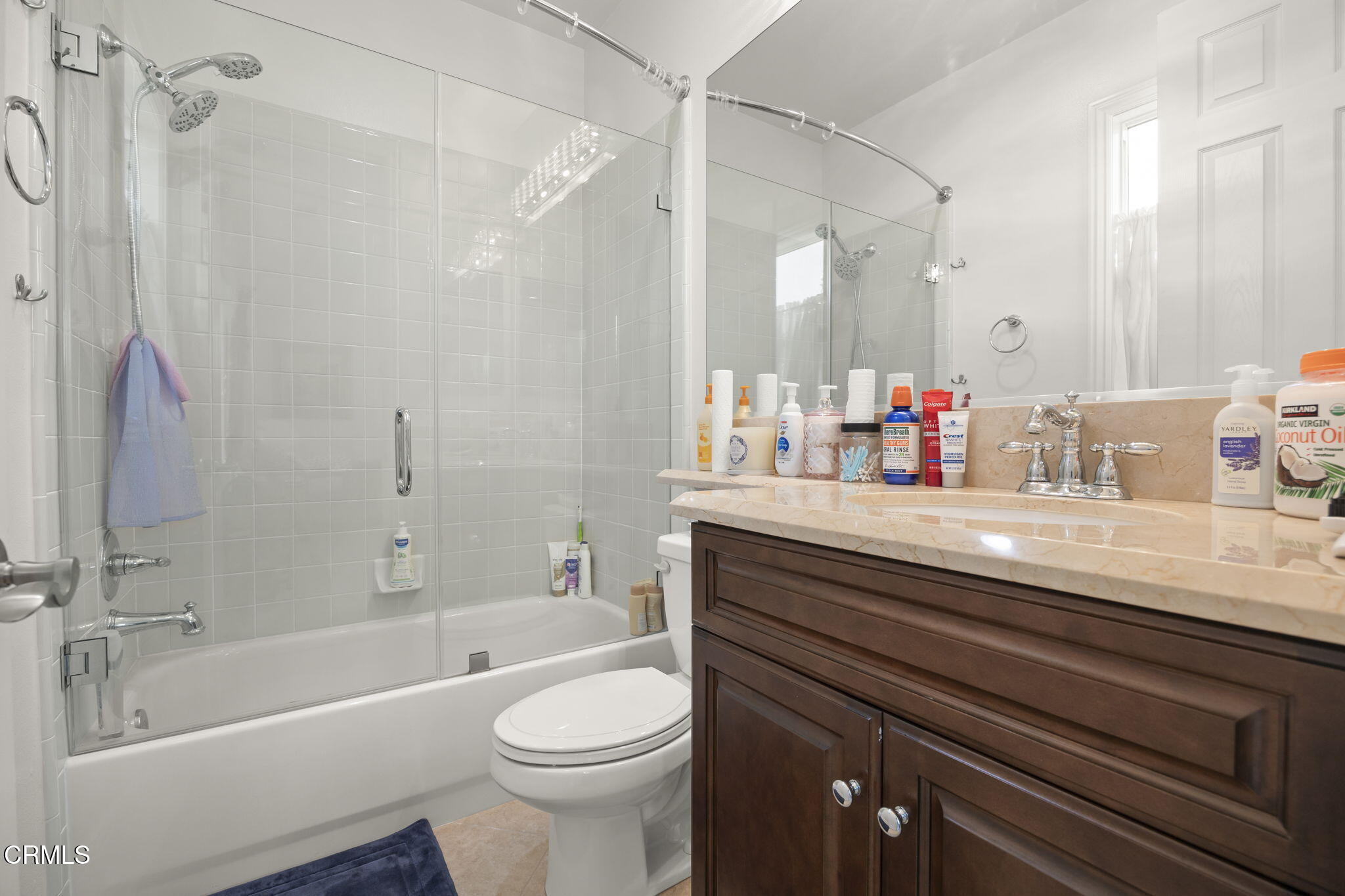 12390 Nelson Road Moorpark, CA 93021 - Photo 46 of 66 a bathroom with a sink a toilet and a bathtub
