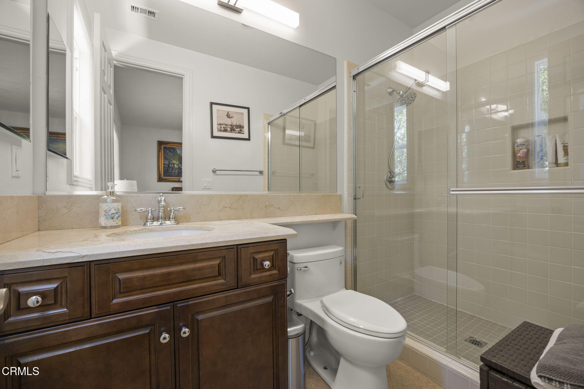 12390 Nelson Road Moorpark, CA 93021 - Photo 48 of 66 a bathroom with a sink toilet and shower