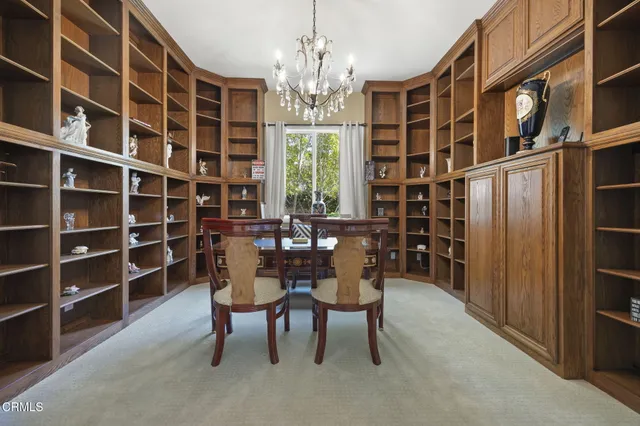 an aerial view of a house with a garden