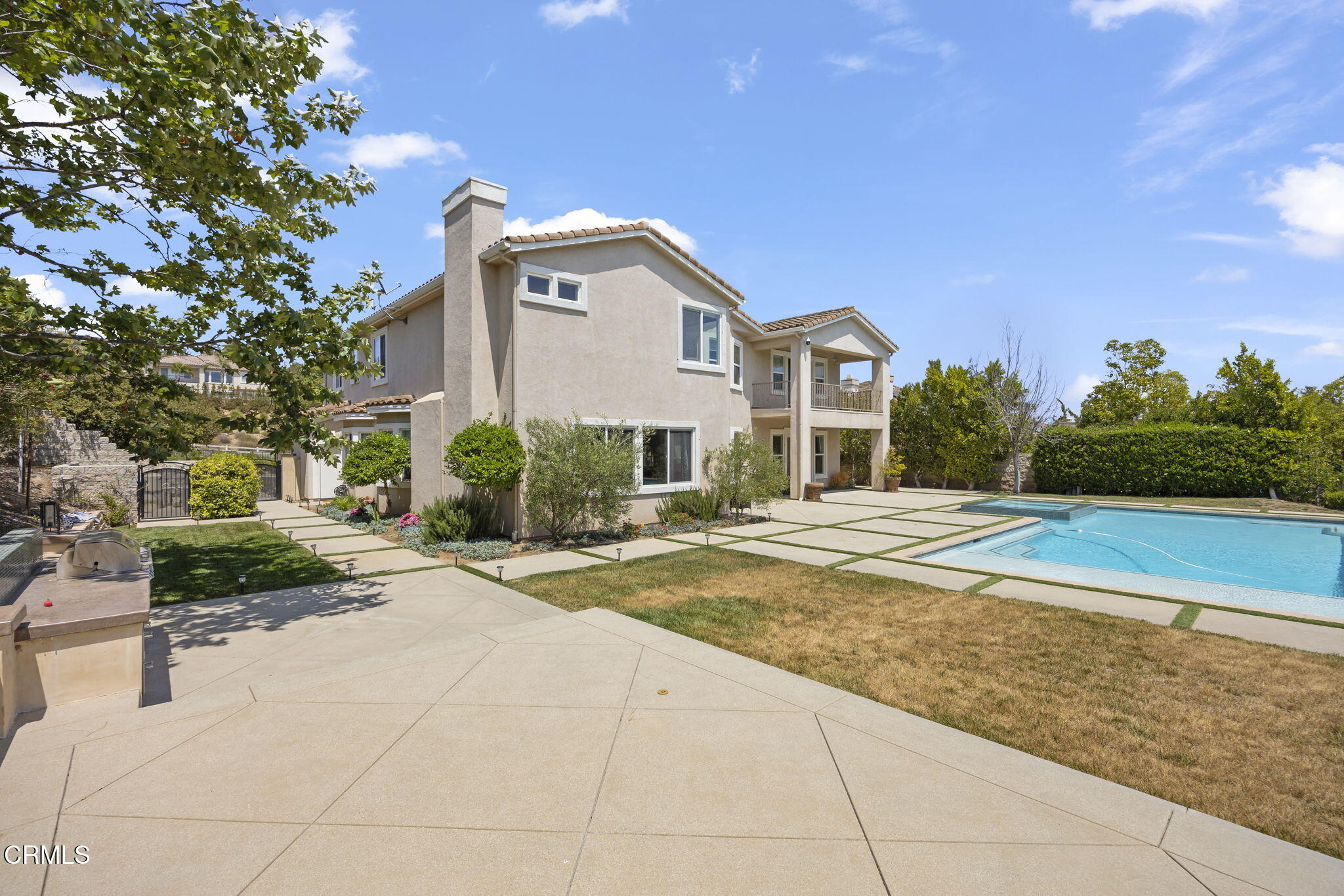 12390 Nelson Road Moorpark, CA 93021 - Photo 58 of 66 a front view of a house with a yard
