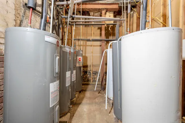 a view of a hallway with wooden shelves