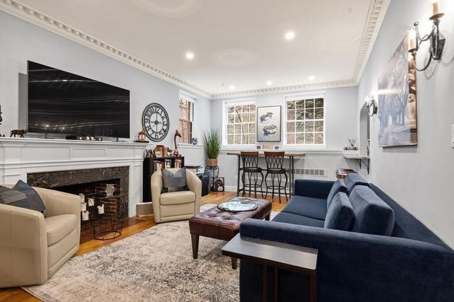 a front door with a table and chairs