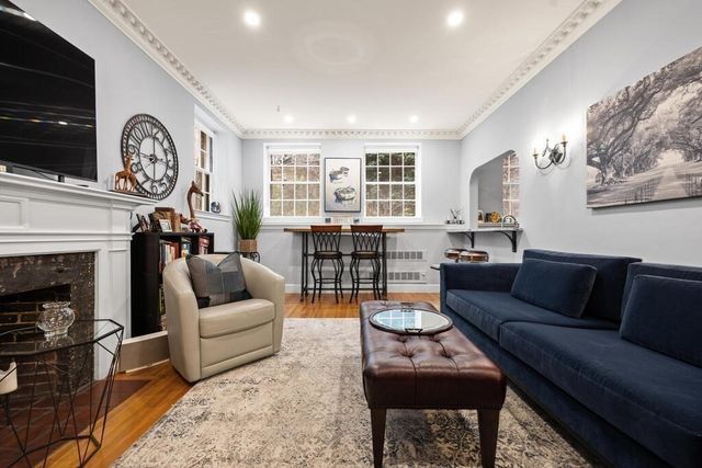a view of a terrace with sitting area
