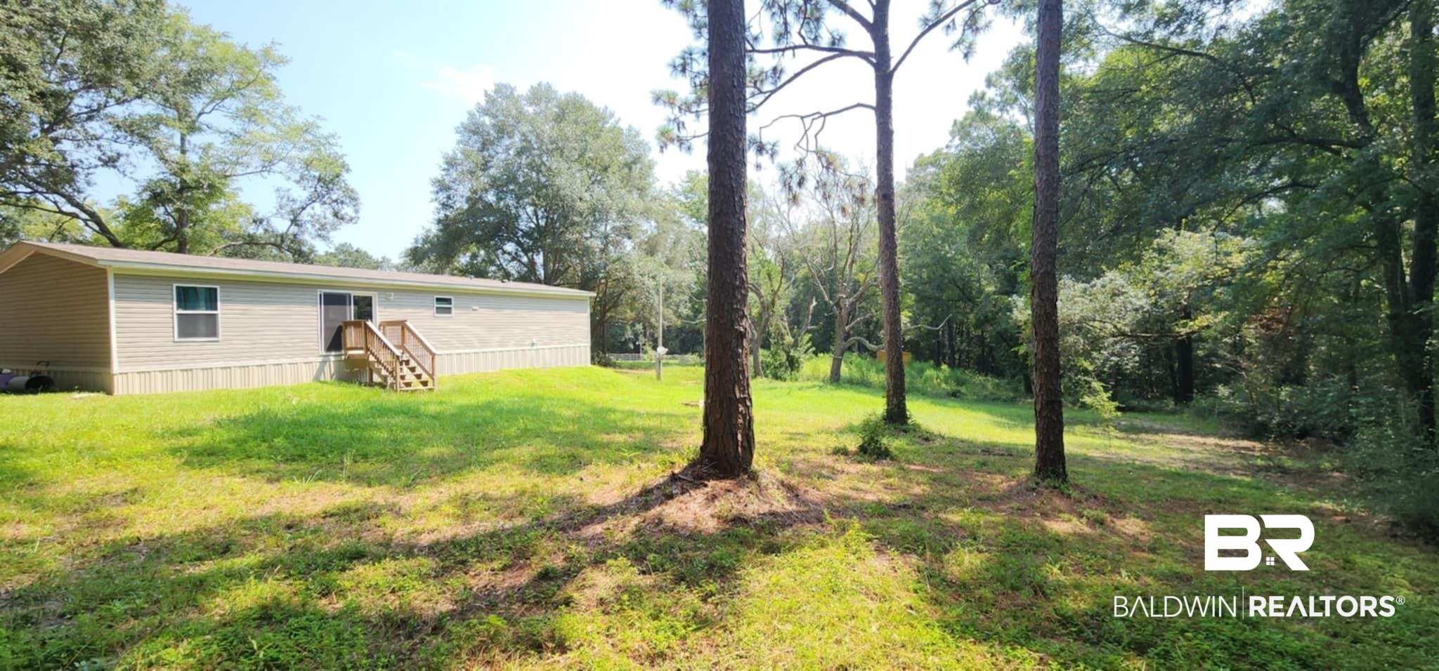 25474 Waterworld Road Robertsdale, AL 36567 - Photo 29 of 30 View of grassy yard