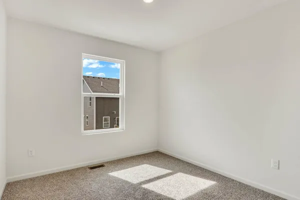 an empty room with window