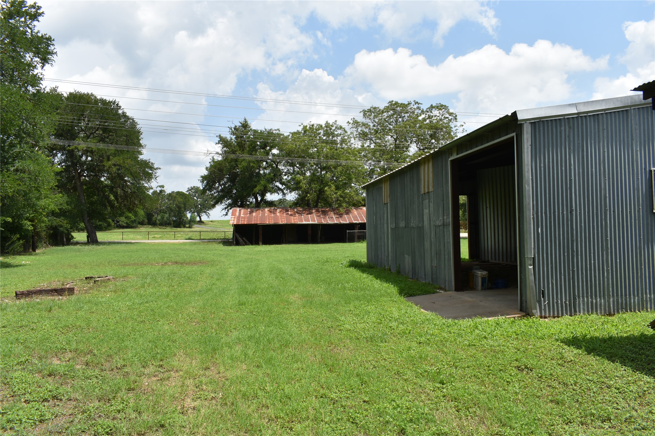 291 Reids Bend Bastrop, TX 78602 - Photo 15 of 39 a view of a backyard with wooden fence