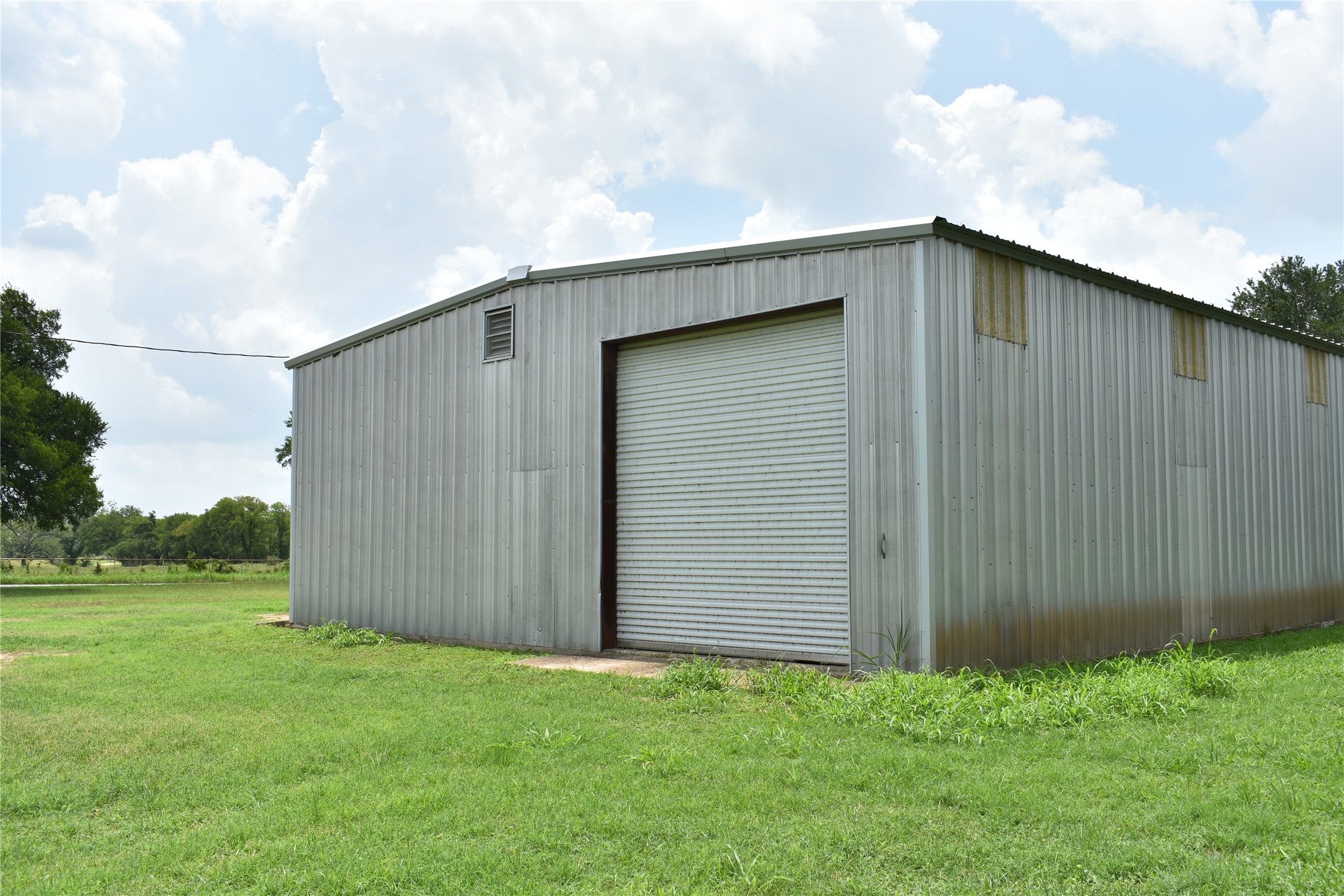 291 Reids Bend Bastrop, TX 78602 - Photo 21 of 39 a backyard of a house with lots of green space
