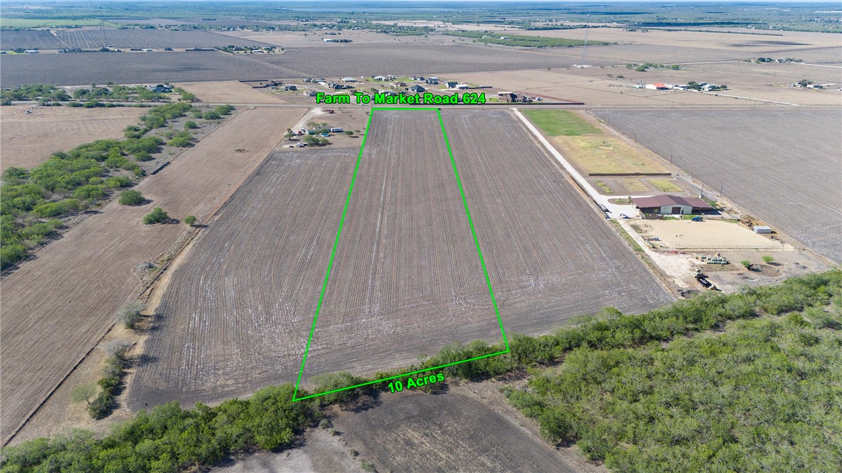 0 Fm 624 Orange Grove, TX 78372 - Photo 8 of 12 a view of a swimming pool with a yard