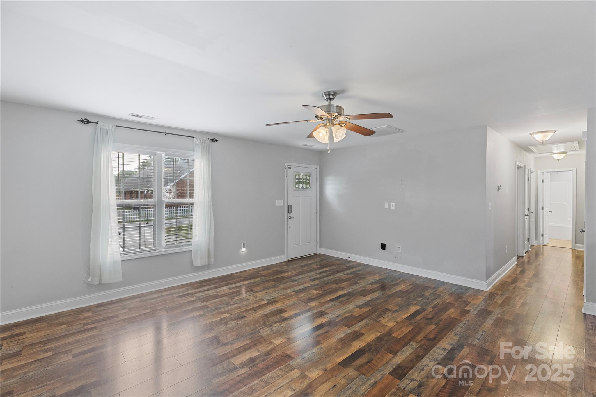 758 Main Street Southwest Concord, NC 28027 - Photo 12 of 25 a view of an empty room with a window
