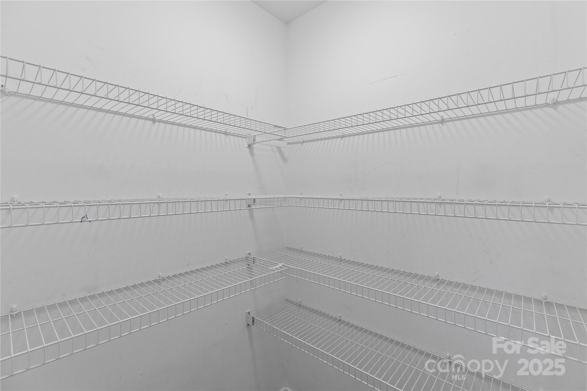 758 Main Street Southwest Concord, NC 28027 - Photo 17 of 25 a view of a room with racks on the wall