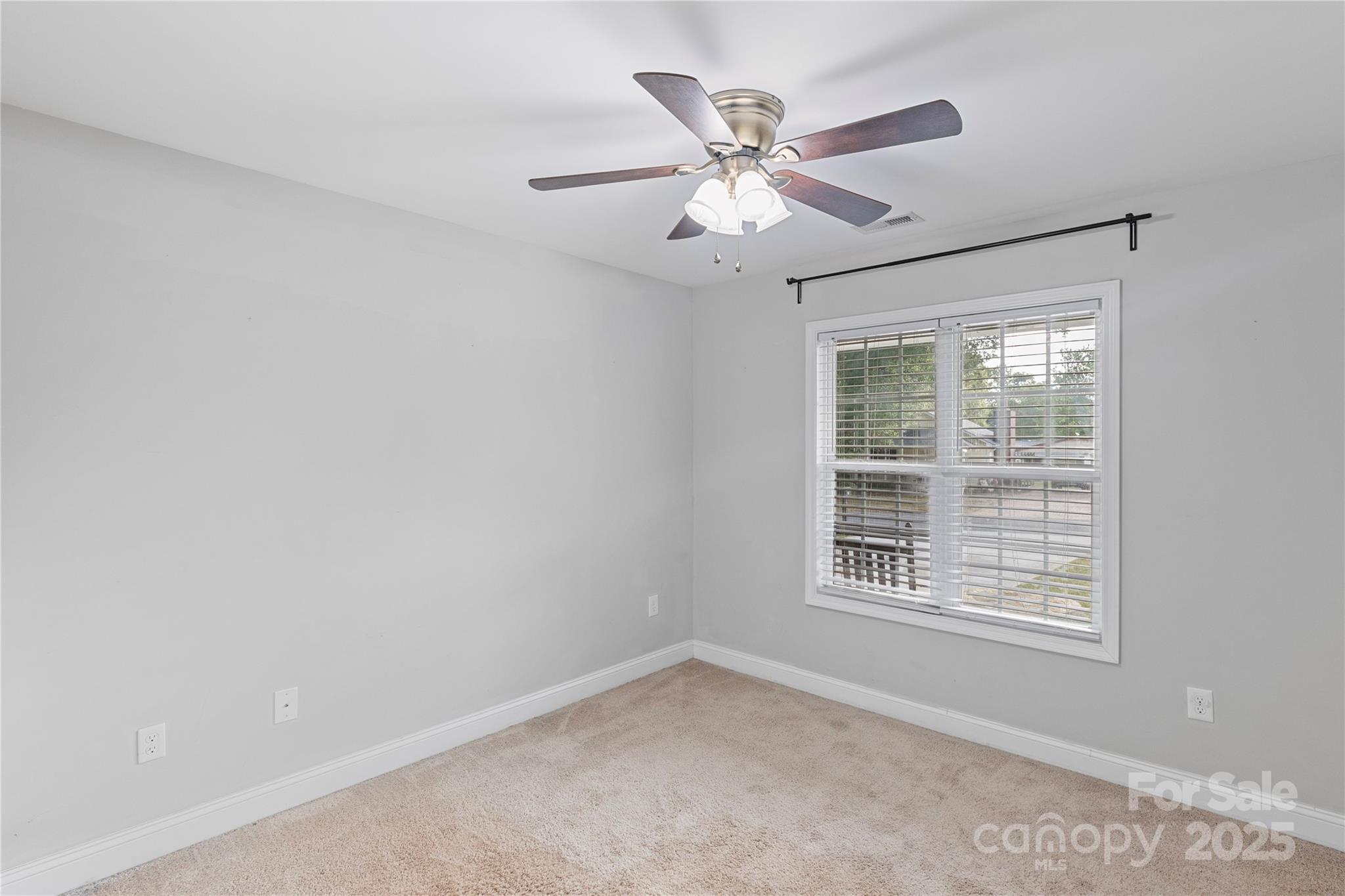 758 Main Street Southwest Concord, NC 28027 - Photo 18 of 25 a view of an empty room with a window
