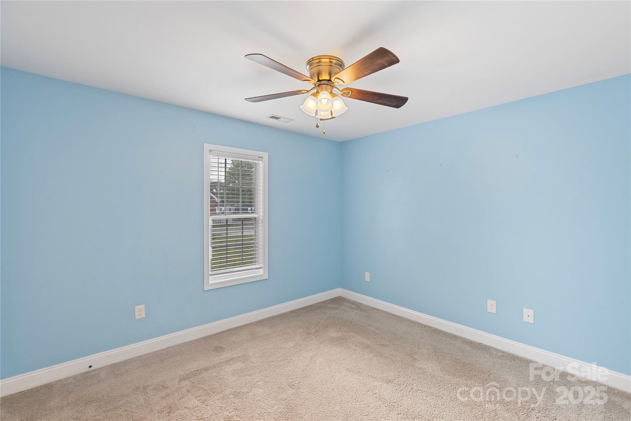 758 Main Street Southwest Concord, NC 28027 - Photo 20 of 25 a view of an empty room with a window