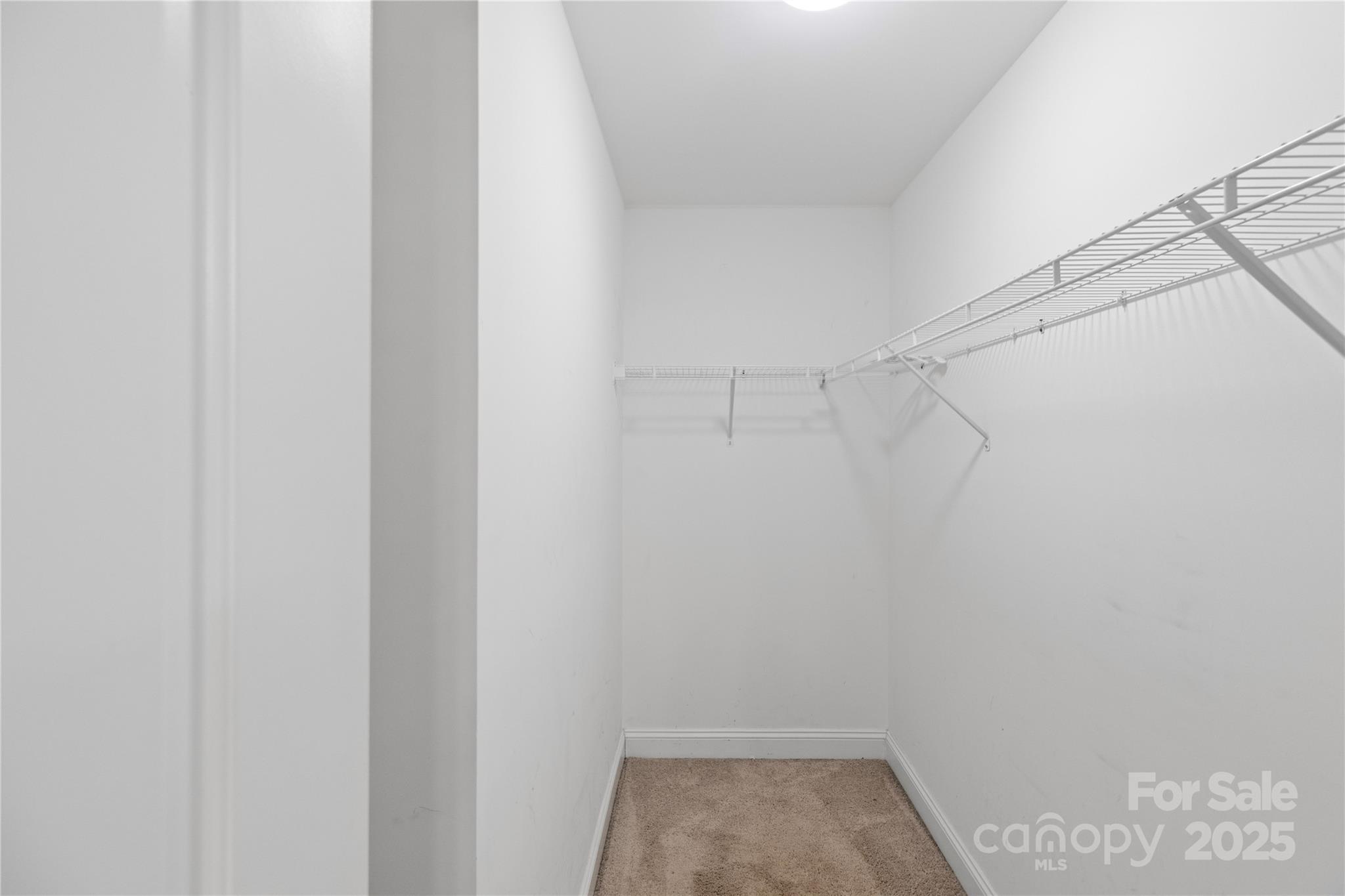 758 Main Street Southwest Concord, NC 28027 - Photo 22 of 25 a view of a room with racks on the wall