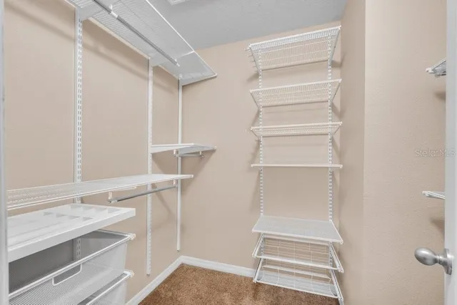 a view of a building with a yard