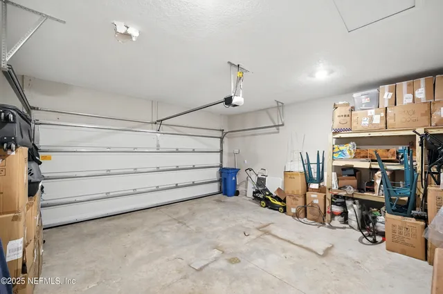 a view of a swimming pool with an outdoor space and seating area