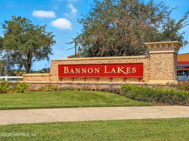 an aerial view of a house with a swimming pool