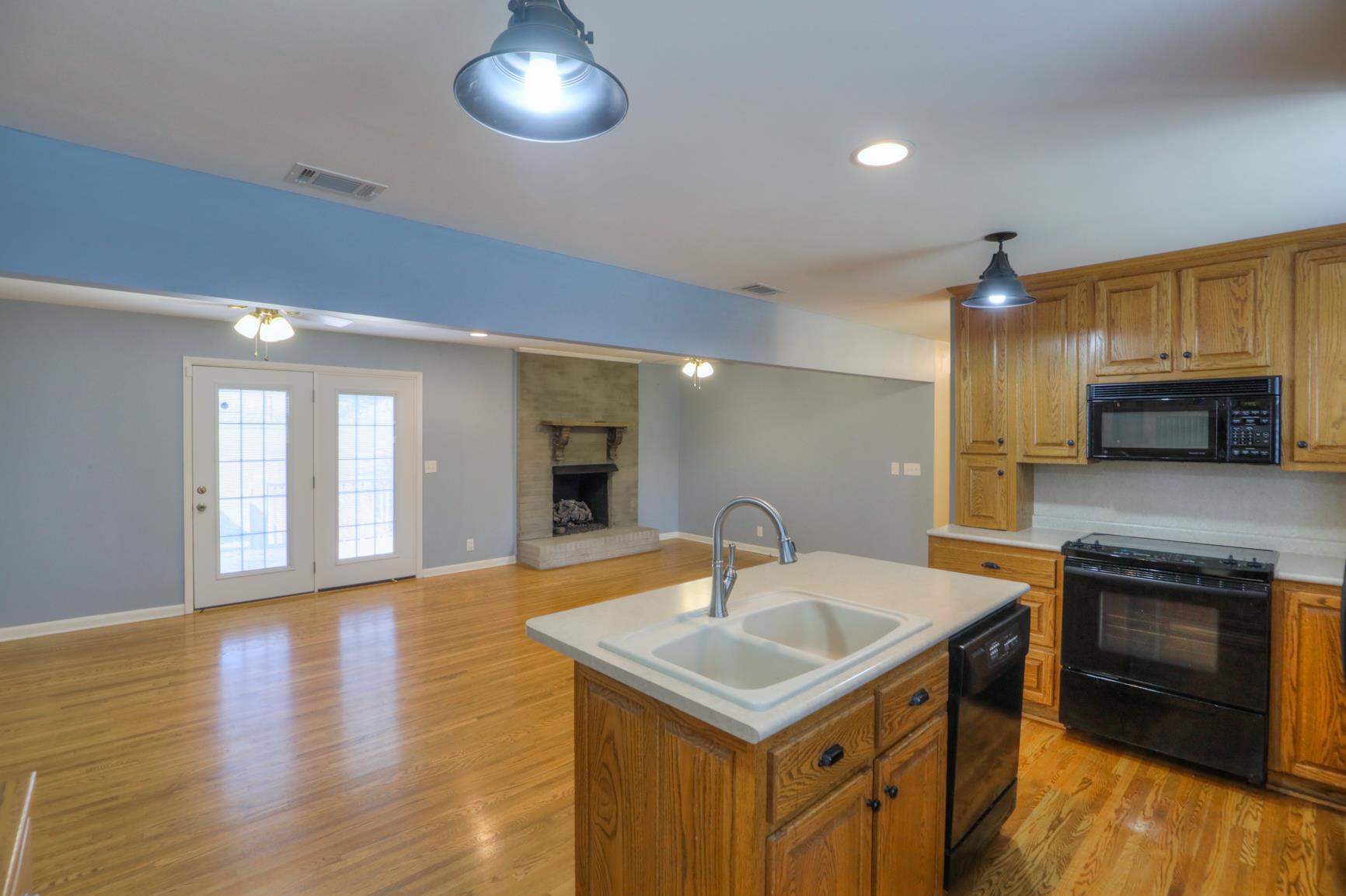 3144 Battle Creek Road Springfield, TN 37172 - Photo 11 of 28 a kitchen with a sink and a refrigerator