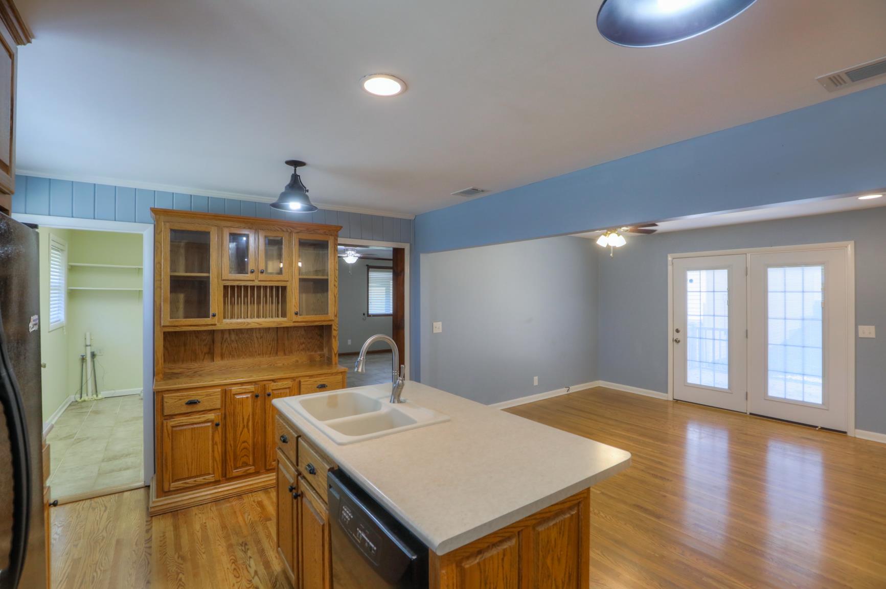 3144 Battle Creek Road Springfield, TN 37172 - Photo 15 of 28 a kitchen with a sink refrigerator and cabinets