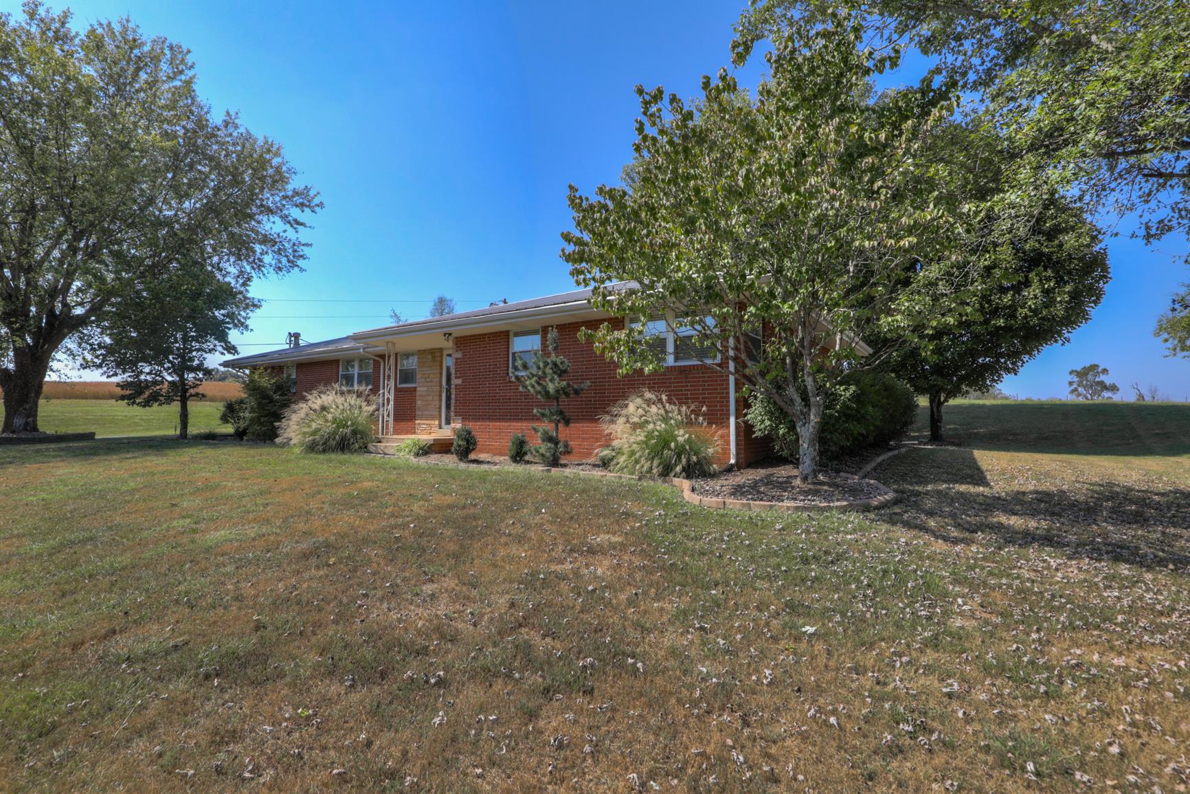 3144 Battle Creek Road Springfield, TN 37172 - Photo 27 of 28 a view of a house with a yard and garage