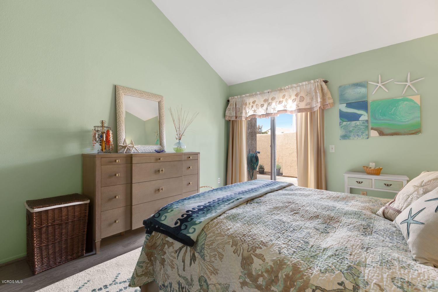 3736 Via Pacifica Walk Oxnard, CA 93035 - Photo 11 of 20 a bedroom with a bed and a dresser